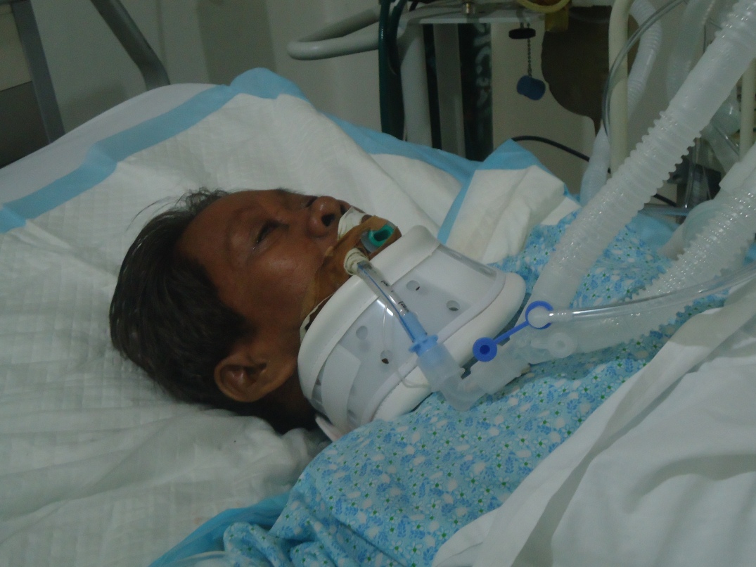 CRITICAL CONDITION Teresita Navacilla, anti open-pit mining activist, in the hospital ICU hours after surviving an assassination attempt. Mining companies NADECOR and St. Augustine Mining Company are set to operate in the Pantukan area, affecting residents like Navacilla (Photo by Hanimay Suazo)